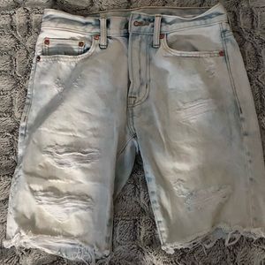 Light blue,ripped American eagle shorts.